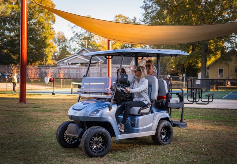 Sirius electric cart featuring Apple CarPlay, ergonomic seating, GPS navigation, and customizable design for luxury transportation in suburban communities.